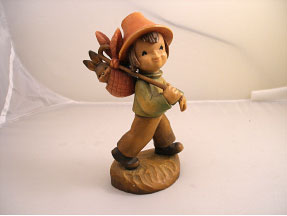 Handcarved wanderlust figurine